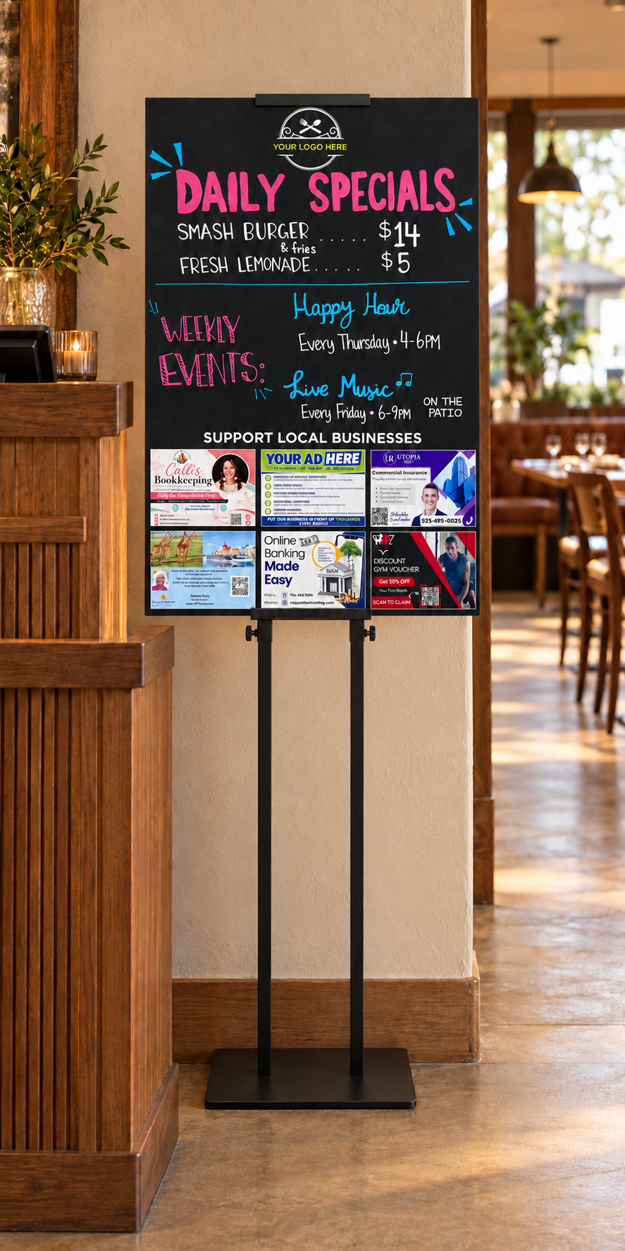 Illustrative board on a tall two-post stand beside a restaurant host station, outside the walkway